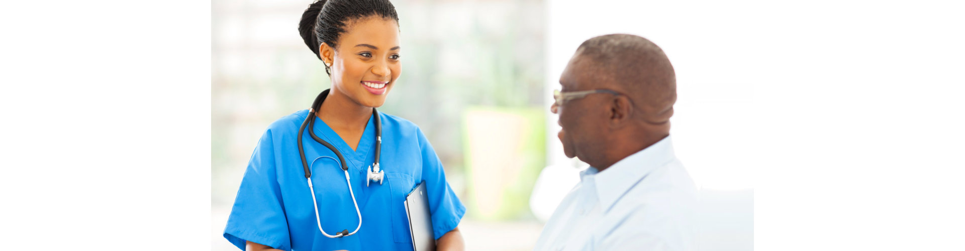 female nurse and senior man shaking hands